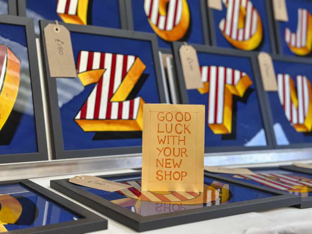 Joby Carter pop up shop display with Good luck card