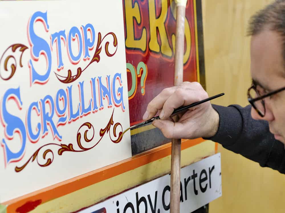 Joby Carter painting fairground art inspired lettering