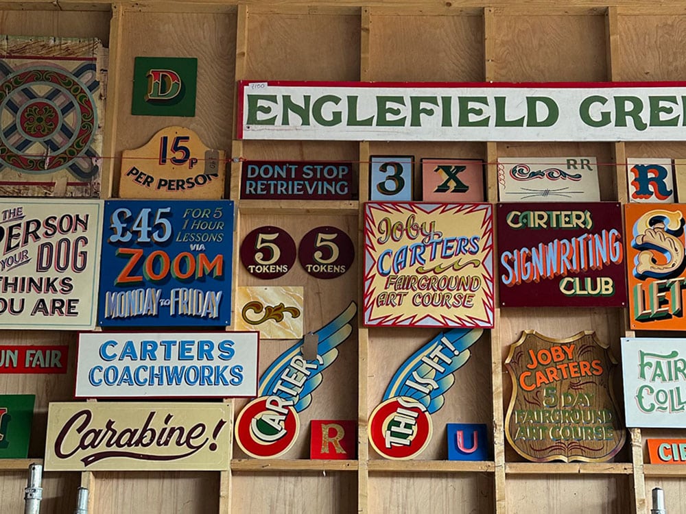 a selection of fairground art and signs