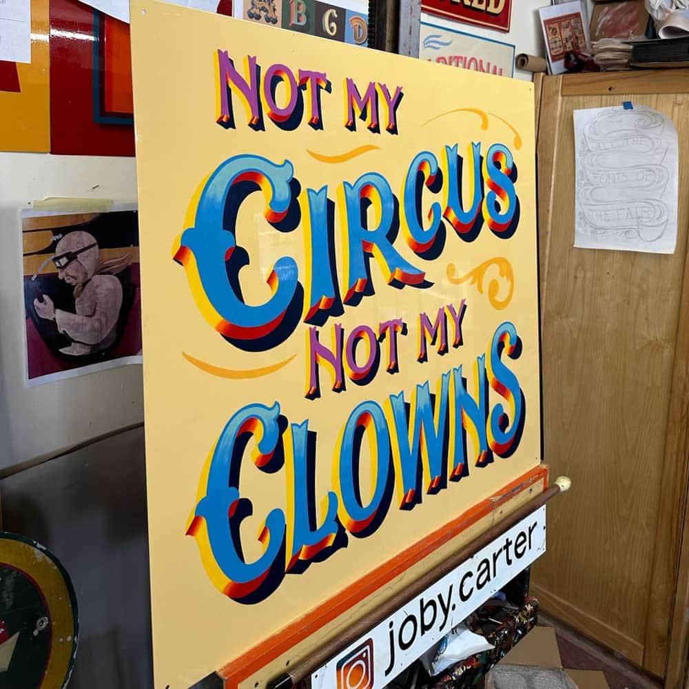 a side on view of a fairground sign