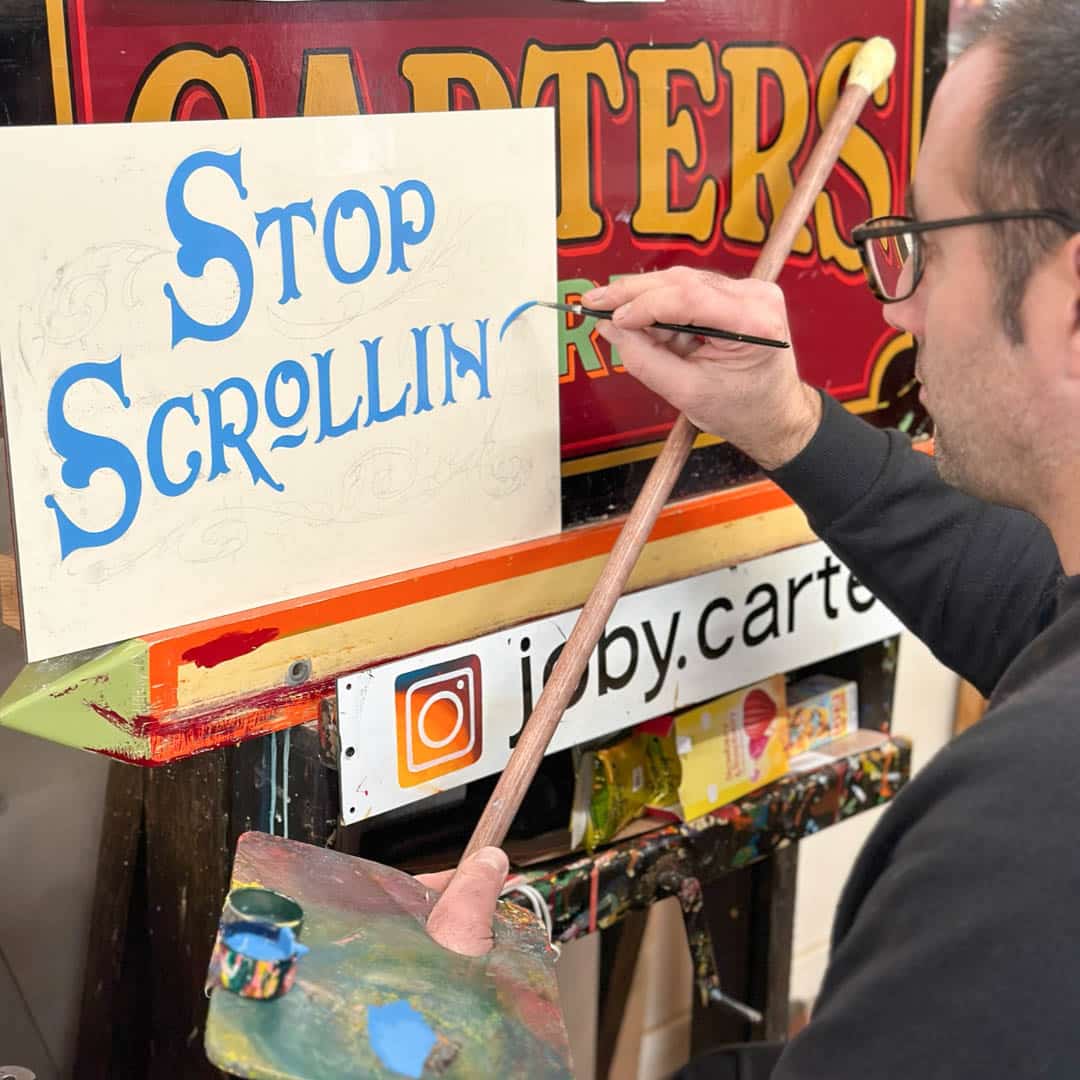 Joby Carter painting Stop Scrolling