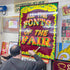 Joby Carter painting the front cover of the book