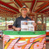 Joby Carter with his signwriting book at the fair