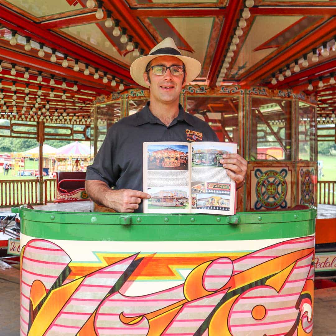 Joby Carter with his signwriting book at the fair