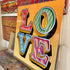 Joby Carter LOVE sign