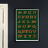 Joby Carter December Green hand painted letters poster