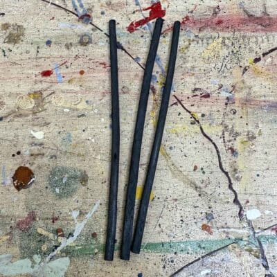 Charcoal sticks used by signwriters to transfer designs