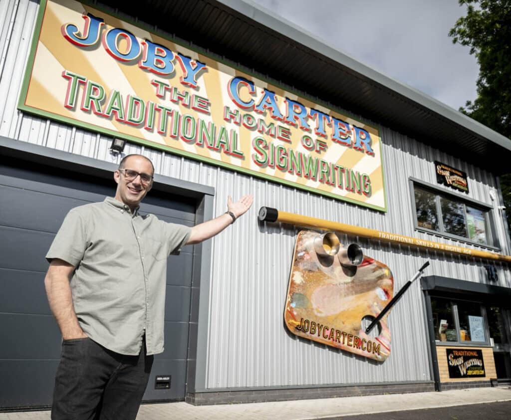 Joby Carter outside of workshop