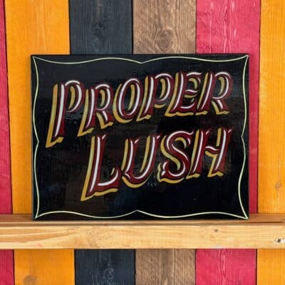 Proper lush hand painted sign