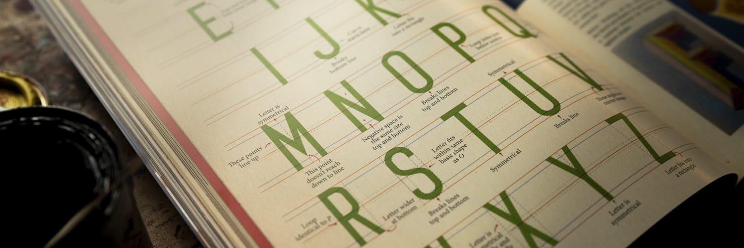 A close up of tips and tricks to help you create hand painted letters shared in Jobys books