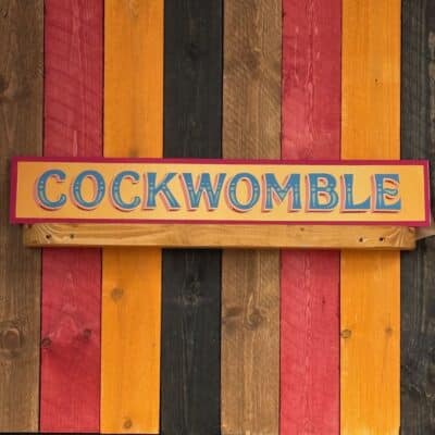 Cockwomble Hand painted Sign