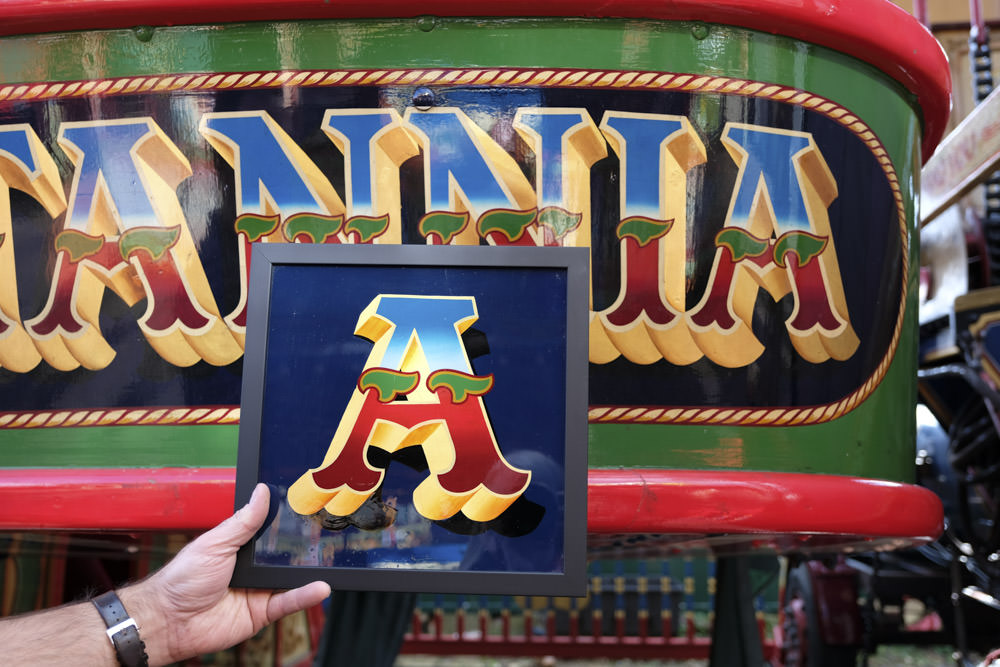 The letter A from the handpainted lettering called Hope wnext to a Steam Yacht from Carters Steam Fair